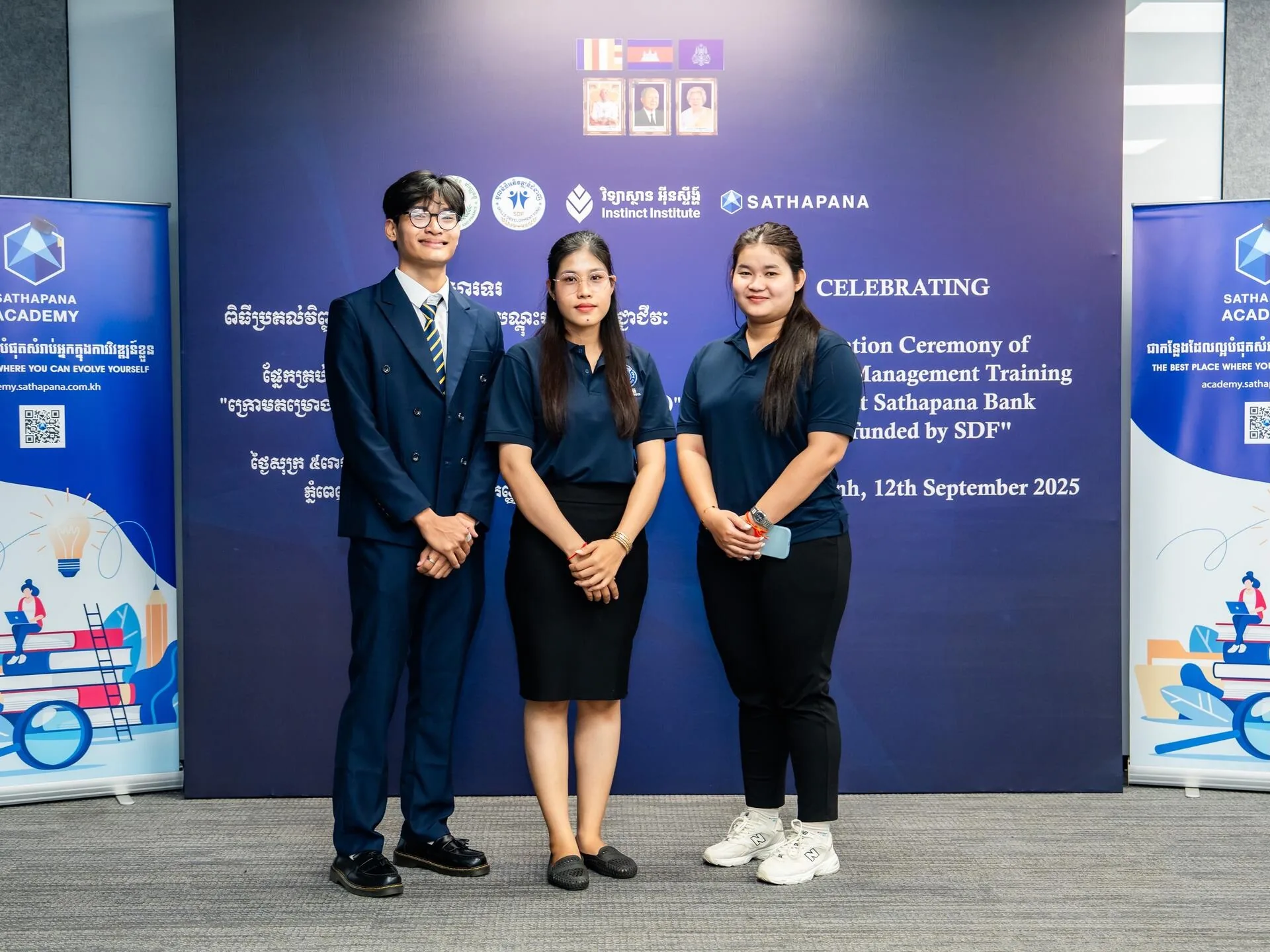 Hou Nestar with colleagues at the graduation ceremony