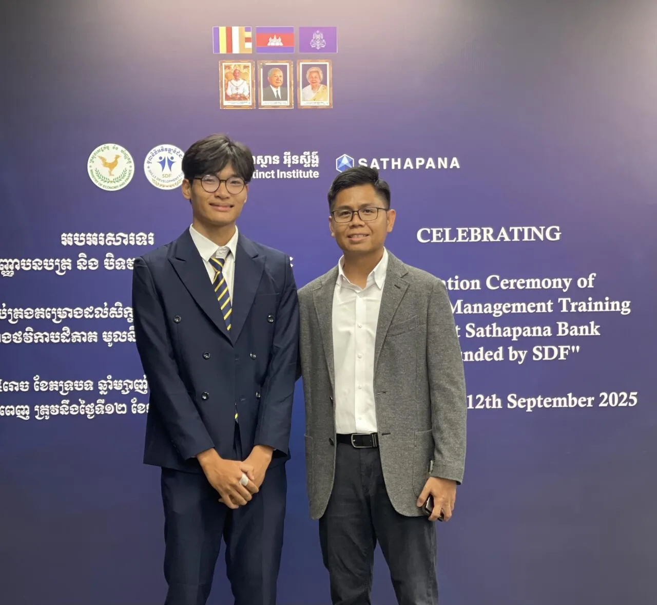 Hou Nestar with his mentor at the graduation ceremony